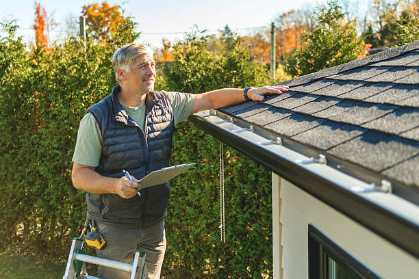 Professional Flat Roof Repair technician working in Hernando, MS